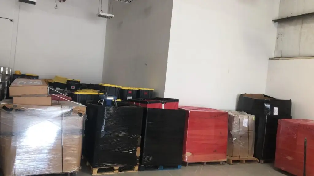 Commercial and industrial materials and equipment packed and stored in GHS warehouses || GHS Movers